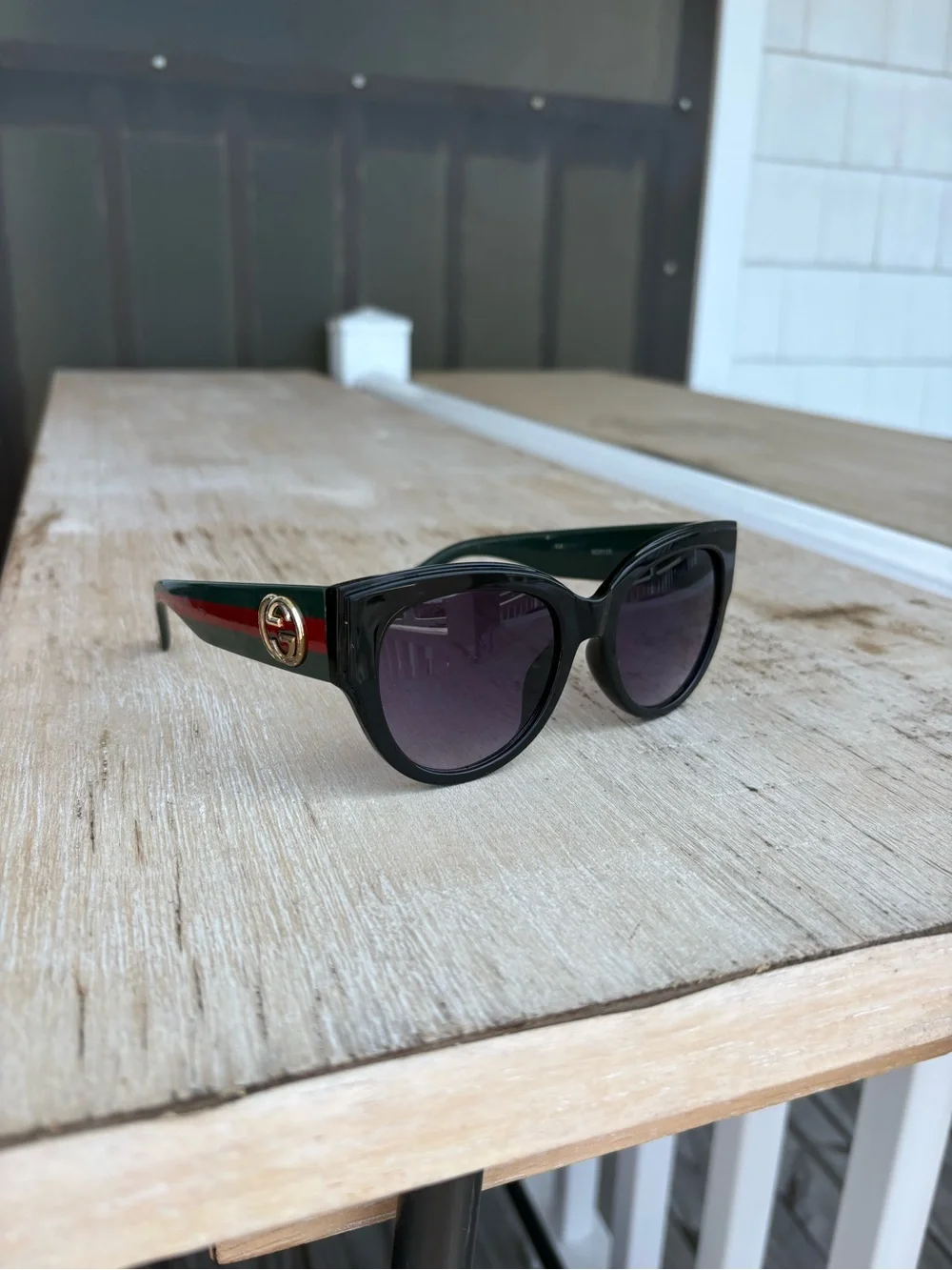 Gucci Black Sunglasses with Green-Red Striped Temples and Gold Logo